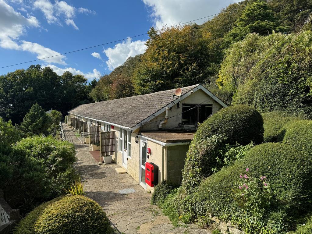 Lot: 59 - FREEHOLD GROUND RENTS FOR EXTENSIVE CHALET SITE - Elevated view of Chalets